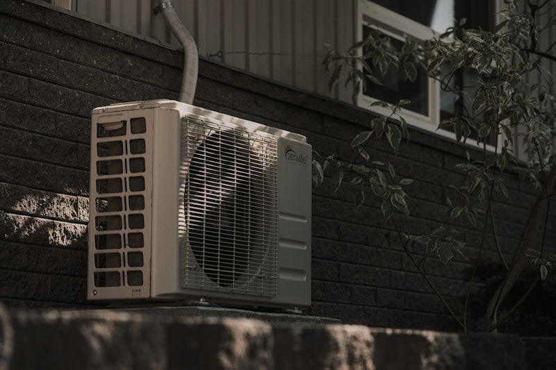 Outdoor air conditioning condenser unit installed at a home